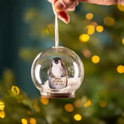 Personalised Illustrated Penguin First Christmas Snow Bauble